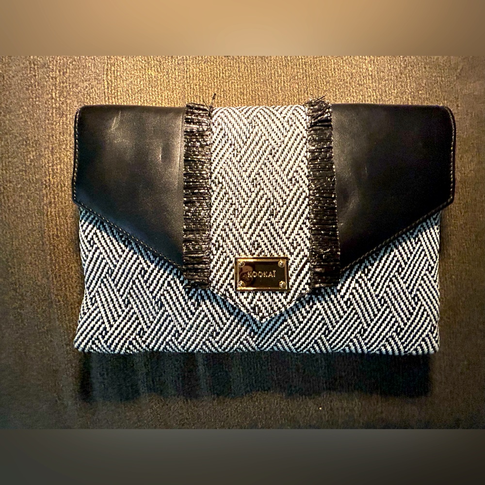 Beautiful kOOKAI Clutch purse, grey black leather. Never used